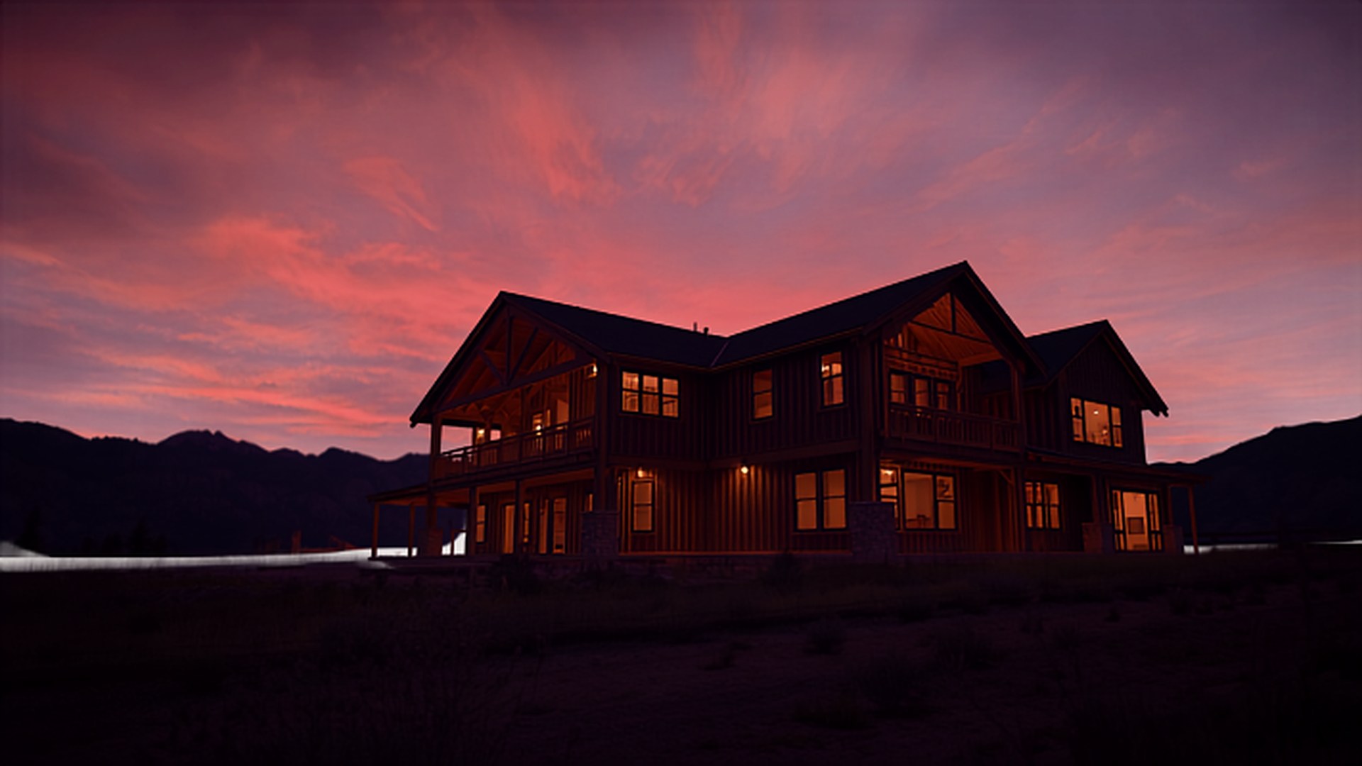 Custom luxury home on a lake at dusk, built by Baird Construction & Development, a B100 licensed general contractor in Roosevelt, Utah